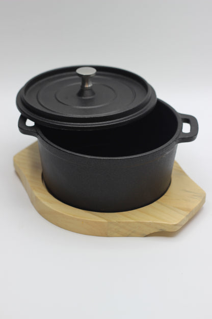 Cast Iron Pot with a Wooden Board