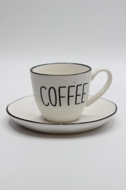 Titled coffee cup and Saucer