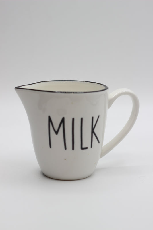 Titled Milk Jug